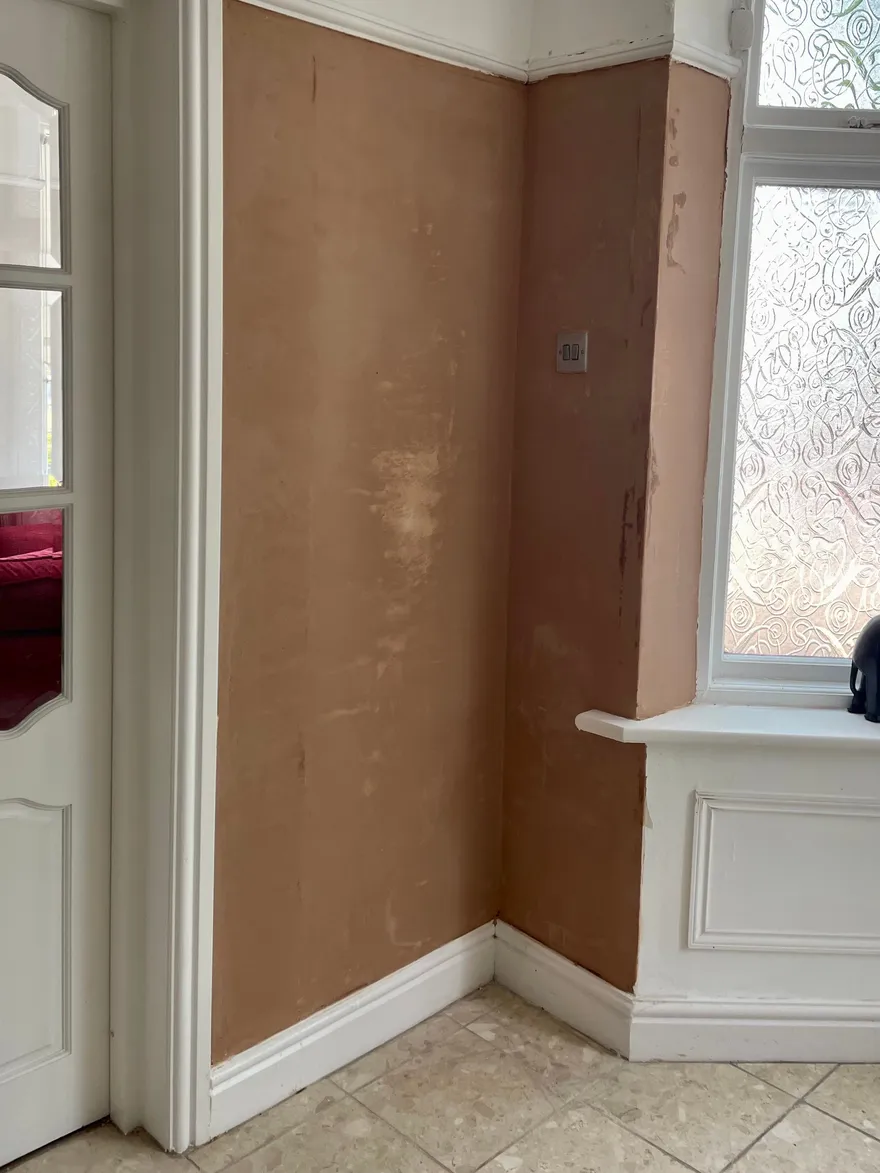 The finished wall, skimmed flat and drying out.