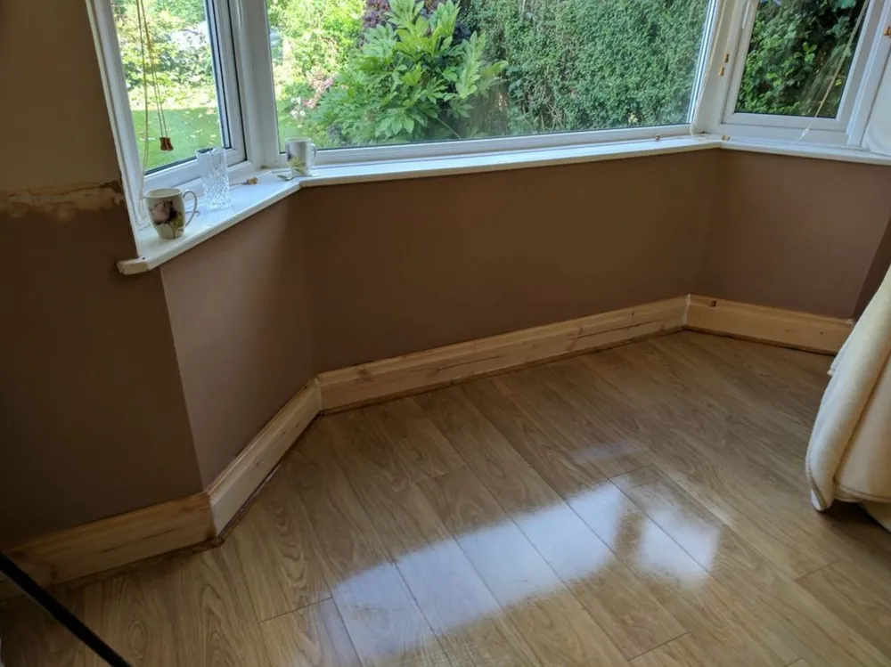 A bedroom replastered throughout and left to dry.